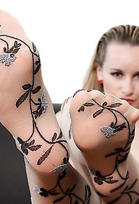 Leggy Claudia nude designer pantyhose with black flowers