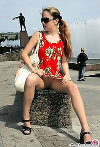 She put on her short dress and a pair of sheer and shiny pantyhose to caress her pussy and her calves and her supple thighs.